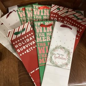 New lot of 12 Christmas wine bags - 3 different designs colors 13” by 5” by 4”